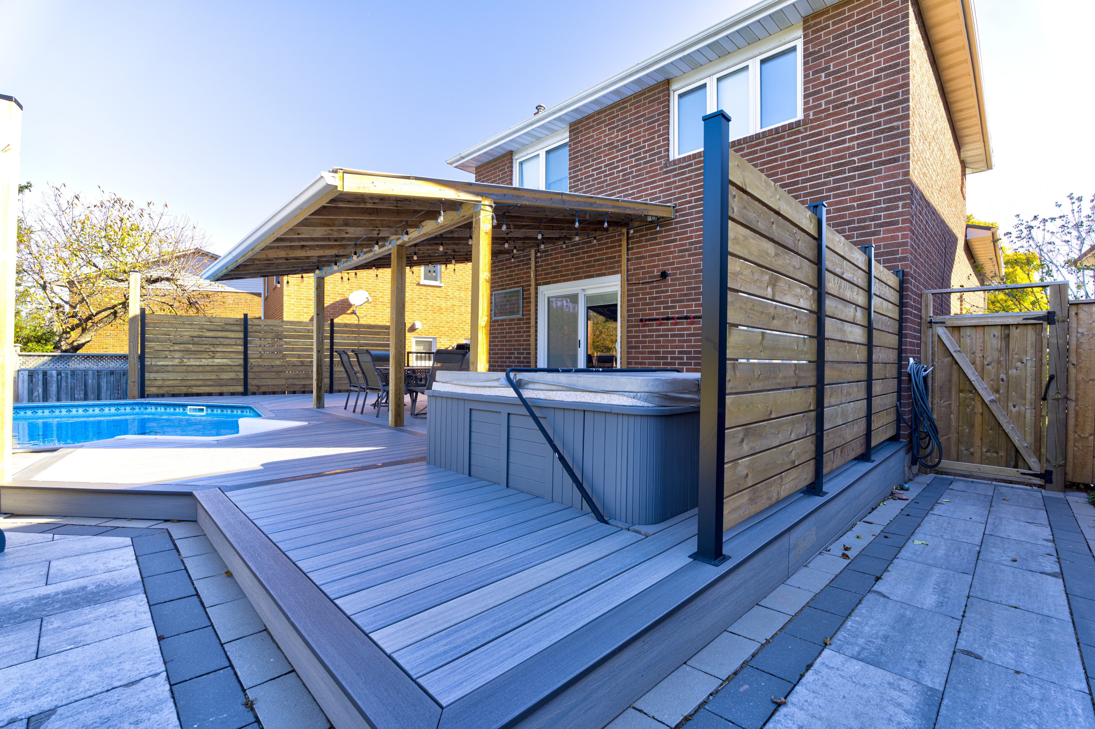 Composite Pool Deck & Screens & Fence & Interlock — landscaping and outdoor project by Oakville Fence Repair | All TruLandscape — photo 2
